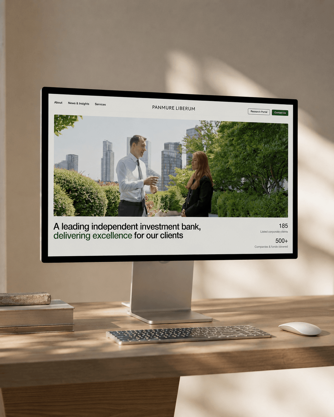 Panmure Liberum website displayed on a desktop monitor
